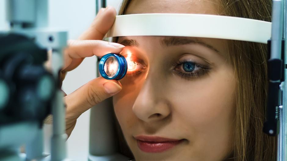 optical technology used on woman in docter's office